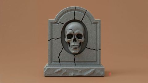 Stone monument with skull relief on engraved base