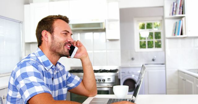 Man Talking Phone Working Laptop Home Office - Download Free Stock Images Pikwizard.com