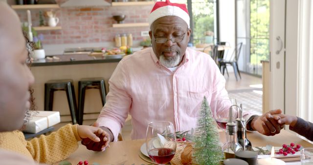 Multigenerational African American Family Praying at Christmas Dinner - Download Free Stock Images Pikwizard.com