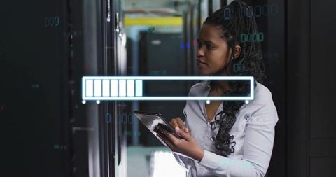 Female it technician monitoring server racks with tablet and digital progress bar overlay