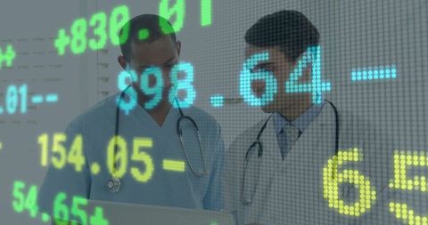 Medical Team Analyzing Digital Data Overlay in Healthcare Facility