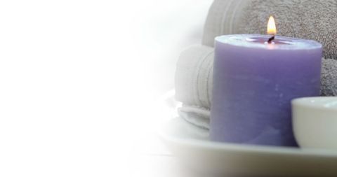 Soothing Spa Elements with Lavender Candle and Towels - Download Free Stock Images Pikwizard.com