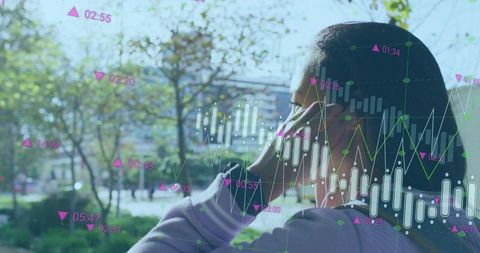 Woman Holding Smartphone in Urban Park Showing Financial Data and Stock Analytics Overlay