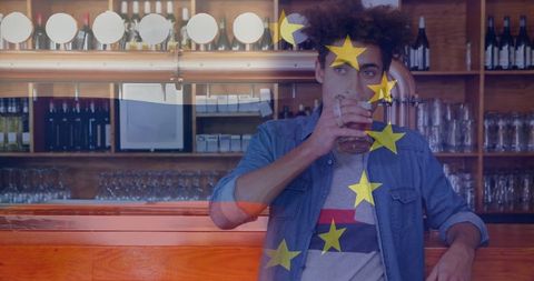 Man Enjoying Pint at Rustic Taproom with European Touch