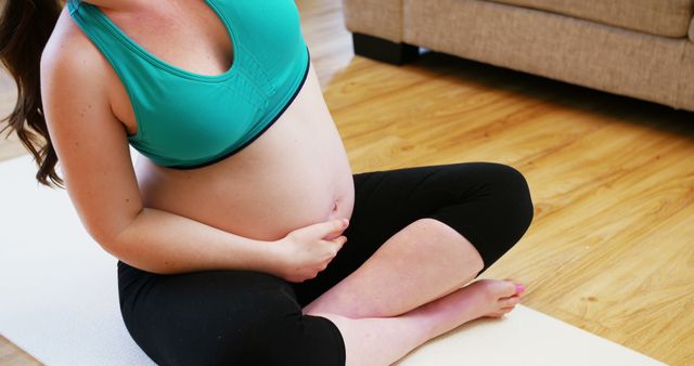 Pregnant Woman Practicing Yoga on Mat at Home - Download Free Stock Images Pikwizard.com