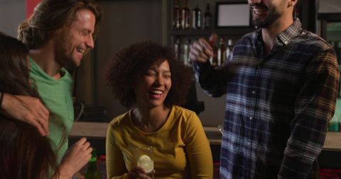 Diverse Friends Enjoying Night Out at Bar