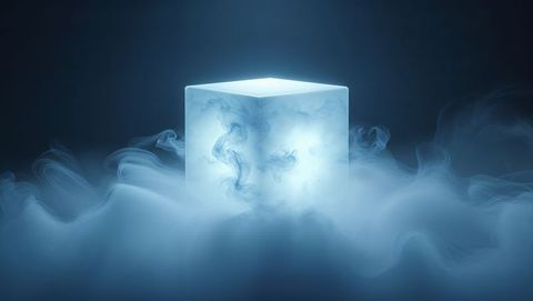Luminous cube illuminating mystical blue mist