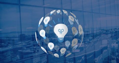 Digital Globe Formed with Light Bulbs Over Cityscape