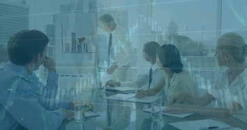 Business Team Analyzing Financial Data During Presentation