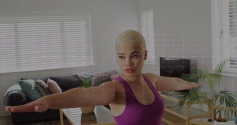 Woman Practicing Yoga with Virtual Heart Rate Monitor