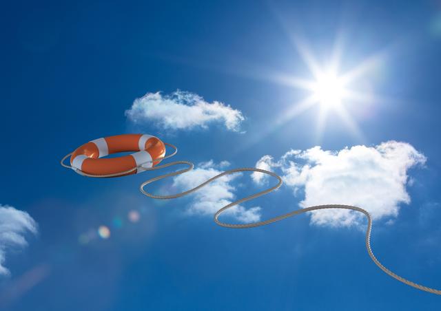 Lifebuoy with rope thrown in mid-air against a bright blue sky with scattered clouds and sunlight. Ideal for use in safety and rescue-themed content, summer and outdoor activities promotions, or illustrating concepts of security and protection.
