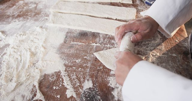 Baker Rolling Out Fresh Dough on Wooden Counter for Pastries - Download Free Stock Images Pikwizard.com