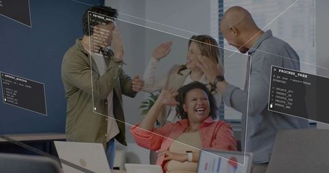 Diverse business team celebrating project win in modern office with analytics overlays