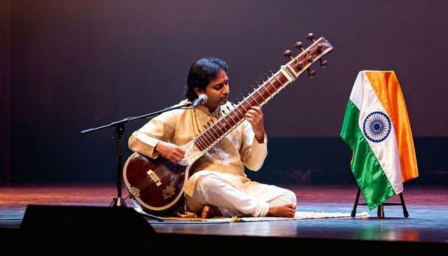Seated indian musician playing sitar on stage with indian flag and traditional kurta