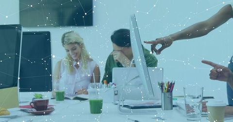 Modern team collaborating in high-tech office environment