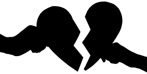 Silhouette of hands holding broken heart on transparent background