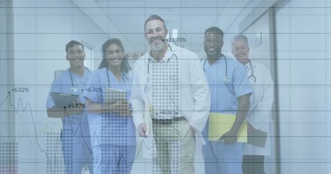 Healthcare Team Analyzing Medical Data in Hospital Corridor