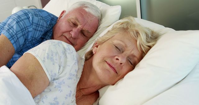 Senior couple sleeping in bed together - Download Free Stock Photos Pikwizard.com