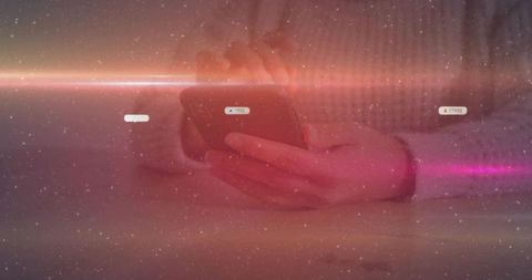 Woman holding smartphone with annotations in cozy home