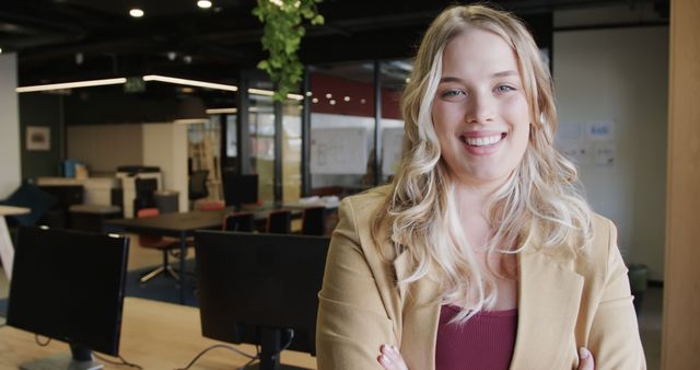 Smiling Confident Professional Woman in Modern Office Setting - Download Free Stock Images Pikwizard.com