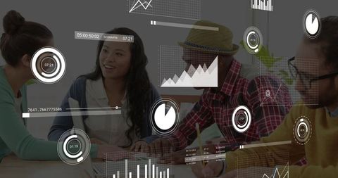 Diverse team collaborating with digital data visualizations