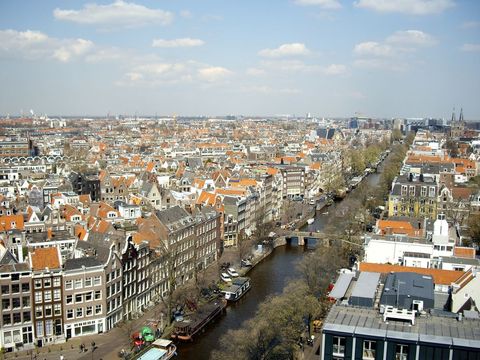 Amsterdam Aerial View of Historic Canals and Brick Rooftops