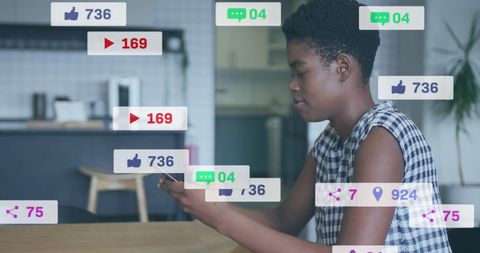 Young Woman Interacting with Digital Social Media Icons on Smartphone