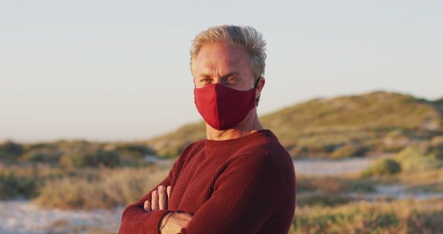 Mature Man with Mask Enjoying Outdoors at Sunset - Download Free Stock Images Pikwizard.com