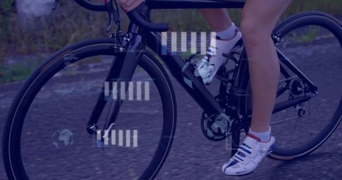 Cyclist Pedaling with Technological Overlay on Fitness Bike