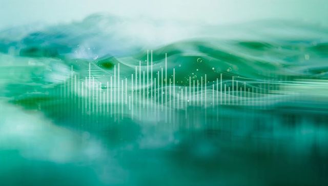 Digital audio waves overlaying abstract ocean background