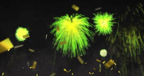 Bright Green Fireworks with Gold Confetti in Night Sky
