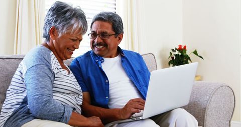 Senior Latino Couple Enjoying Digital Connection at Home - Download Free Stock Images Pikwizard.com