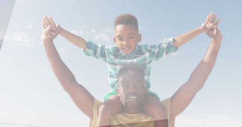 Joyful Father and Son Bonding Outdoors on Sunny Day - Download Free Stock Images Pikwizard.com