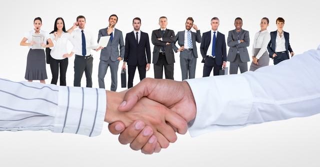 Business Handshake Seals Deal with Team in Background - Download Free Stock Photos Pikwizard.com