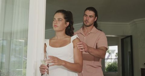 Couple sharing emotional moment at home