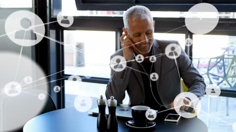 Businessman in Modern Office Discussing Networking