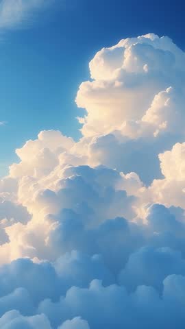 Soaring cumulus clouds glowing in sunlit sky Vertical footage for serene backgrounds