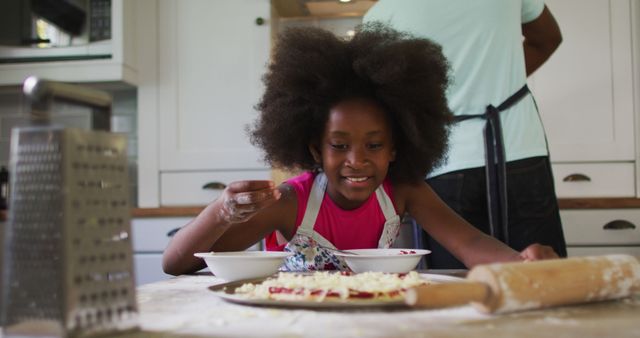 Child Making Homemade Pizza with Adult in Kitchen - Download Free Stock Images Pikwizard.com