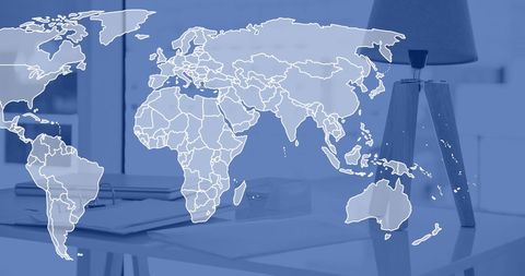 World Map Overlay on Empty Office Workspace