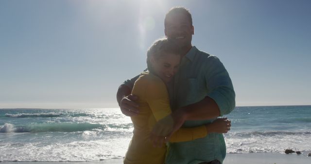 Mixed-Tense Couple Embracing on Sunny Beach - Download Free Stock Images Pikwizard.com