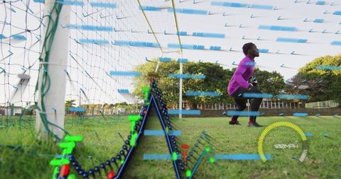 Focused Goalkeeper During Training with Dynamic Digital Overlay