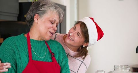 Holiday Baking Joy with Mother and Daughter Embracing Tradition