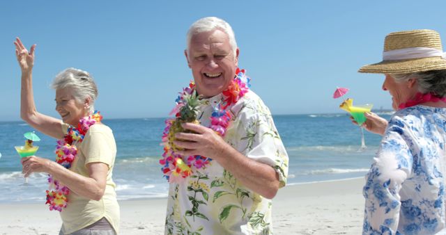 Senior friends having fun at a tropical beach party, wearing leis and enjoying refreshing drinks. Ideal for themes related to retirement, summer vacations, friendship, and joyful senior living.