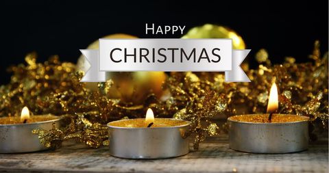 Christmas greetings with candles and golden decorations