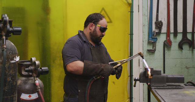 Welder Working with Welding Torch in Industrial Workshop - Download Free Stock Images Pikwizard.com