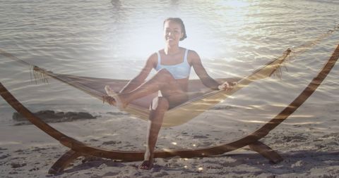 African American Woman Relaxing in Hammock at Beach Sunset - Download Free Stock Images Pikwizard.com