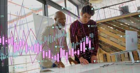 Diverse team discussing blueprints and graphs in modern office