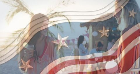 Patriotic Celebration on Beach with Friends under Sunset Sky