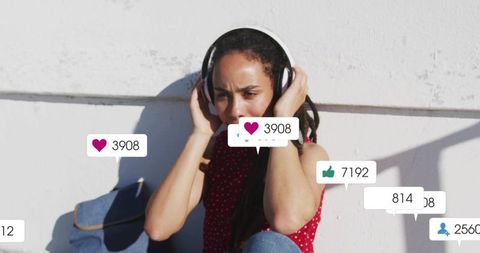 Woman relaxing with headphones and social media interaction overlays