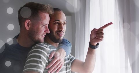 Couple Embracing and Gazing Outside Together